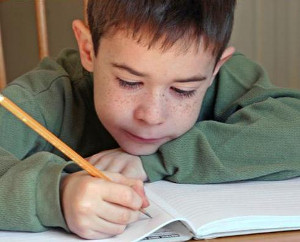 boy doing a puzzle